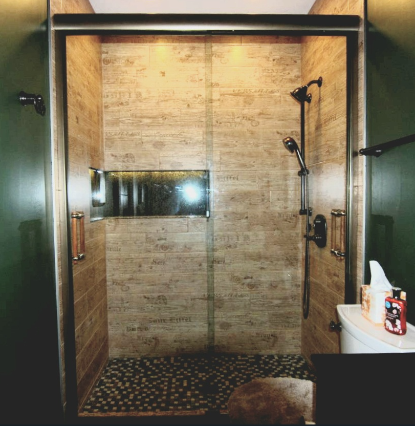 This custom powder coated sliding system incorporates teak handles! What a fun design!