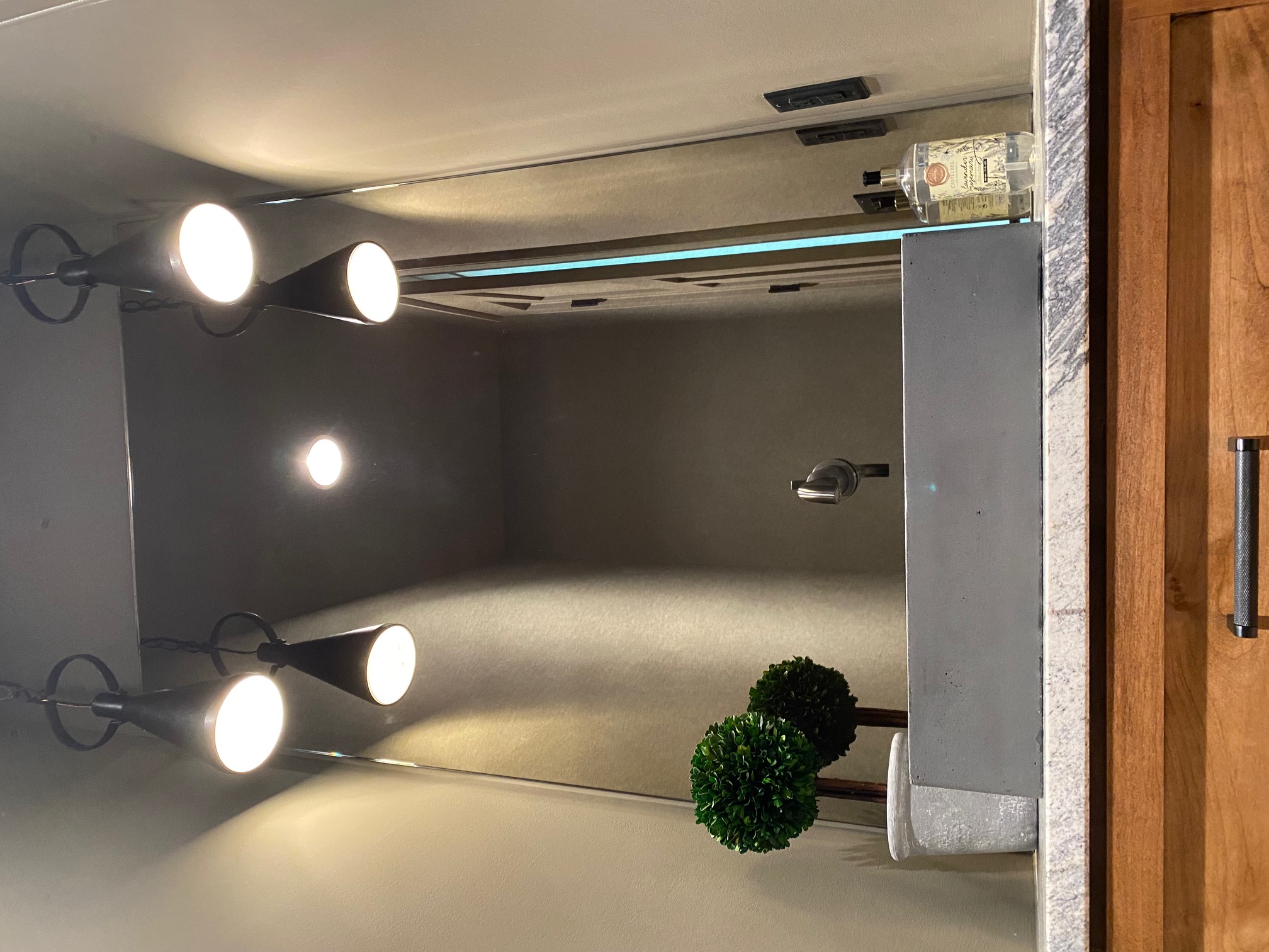 This antique mirror is the Soft White Antique Mirror pattern. Find this and more in our showroom!