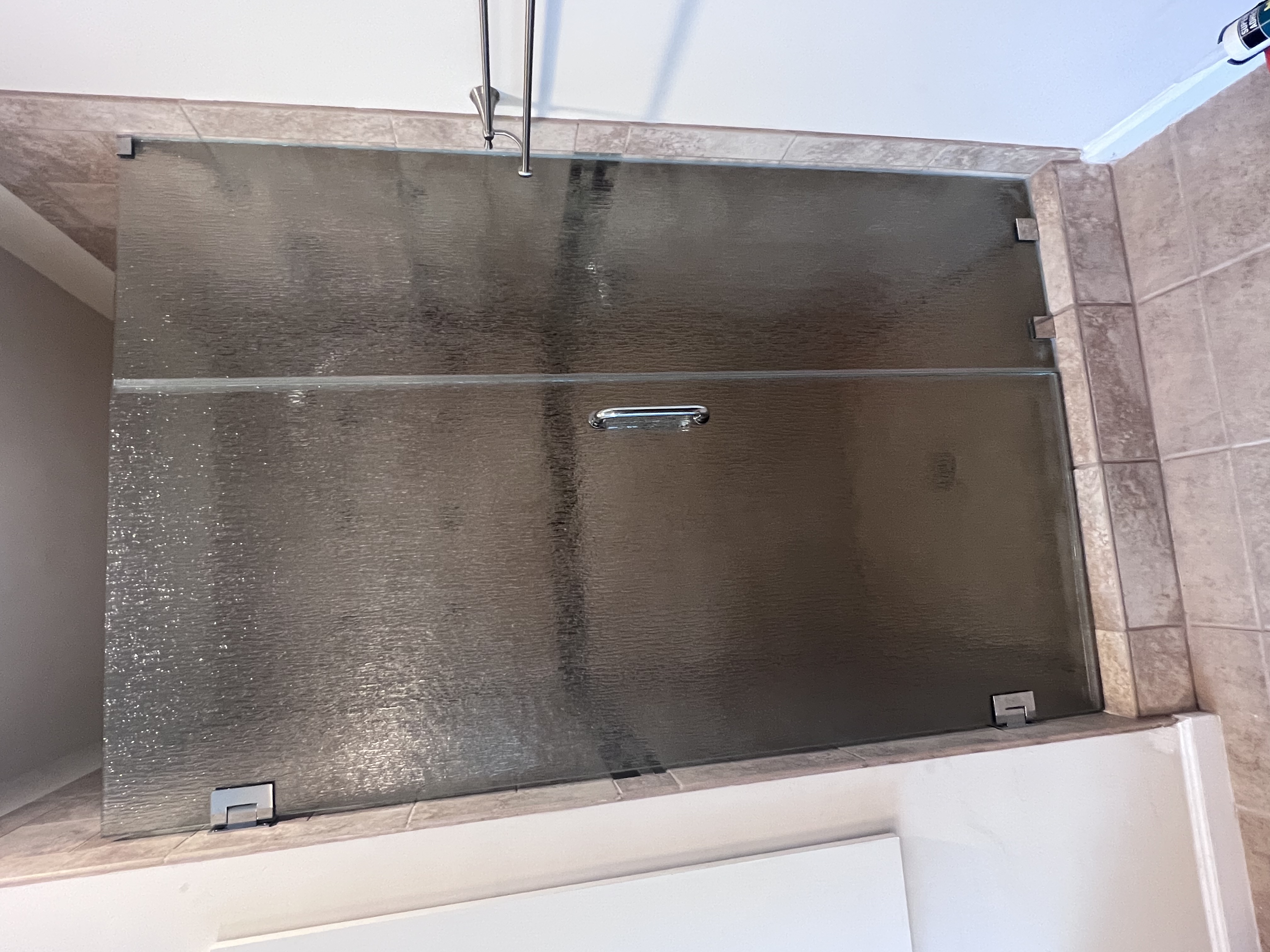 This shower features rain glass for privacy and luxury!